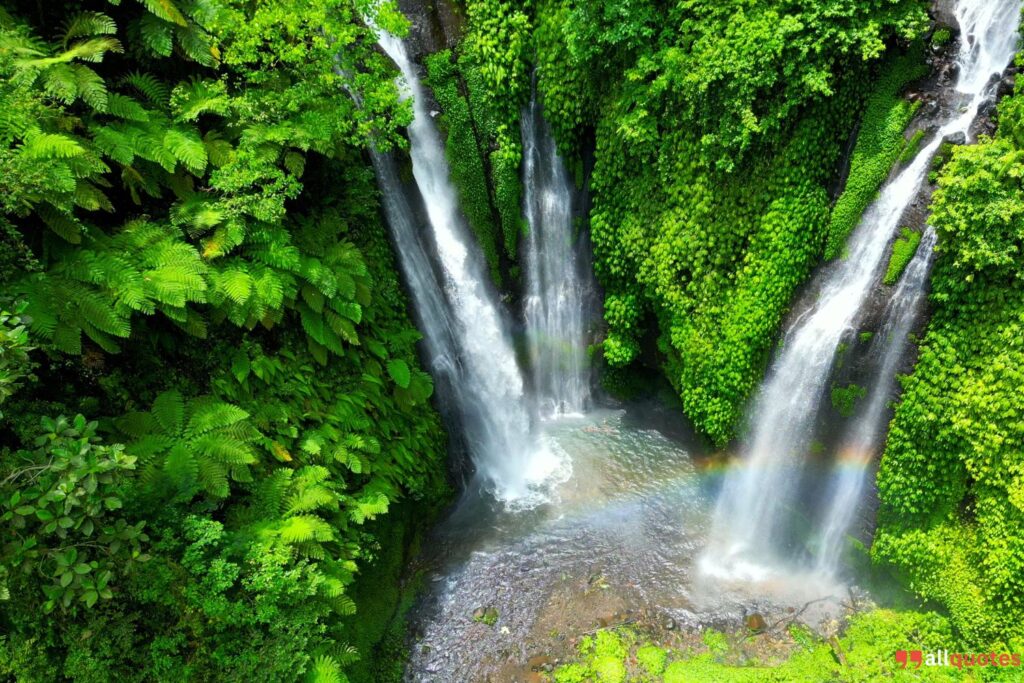 a beautiful Waterfall picture with a rainbow